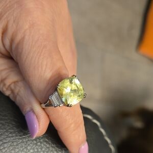 Elegant 9.25 Sterling Silver Ring with Yellow Gemstone